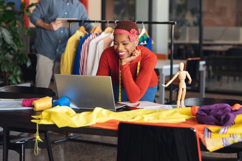 Smiling african american fashion designer